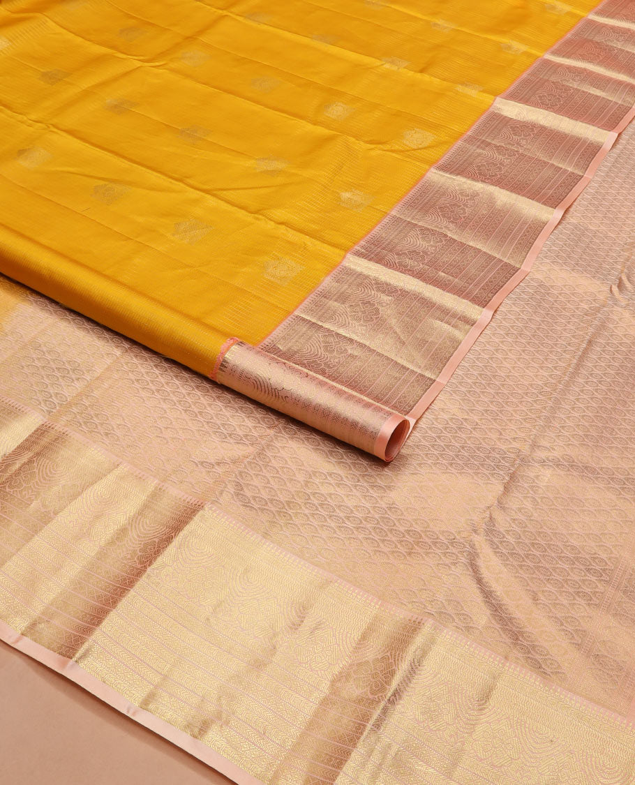 Yellow zari buttas and checked silk saree, contrast border of rekku, muthu, kathir, diamond, rudraksham, and floral designs, and jaal pallu