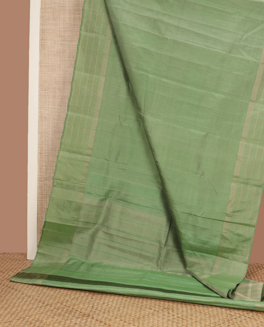 Green zari micro-checked silk saree, zari striped border & zari stripes steeped pallu