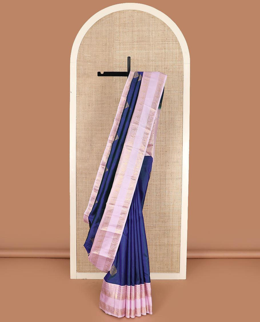 Blue zari buttas silk saree with contrast rettai pettu border of rekku, kathir, and mayil designs, and zari-rich pallu