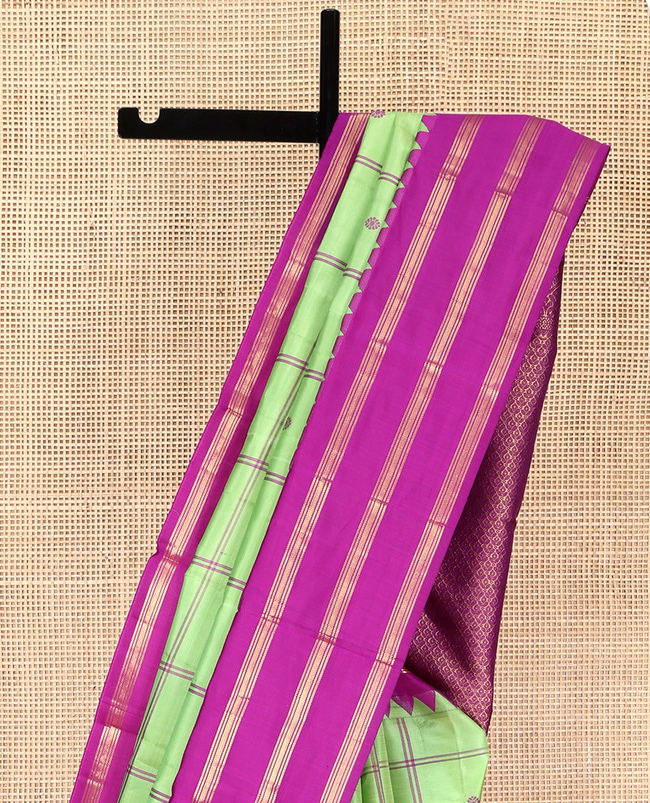 Green Vasundhara Silk Saree, Delicately Woven with Butta Enclosed Checks, Complemented by a Contrast Thazampoo Rekku Border of Banaras, Intricately Designed Pallu, and a Contrast Blouse