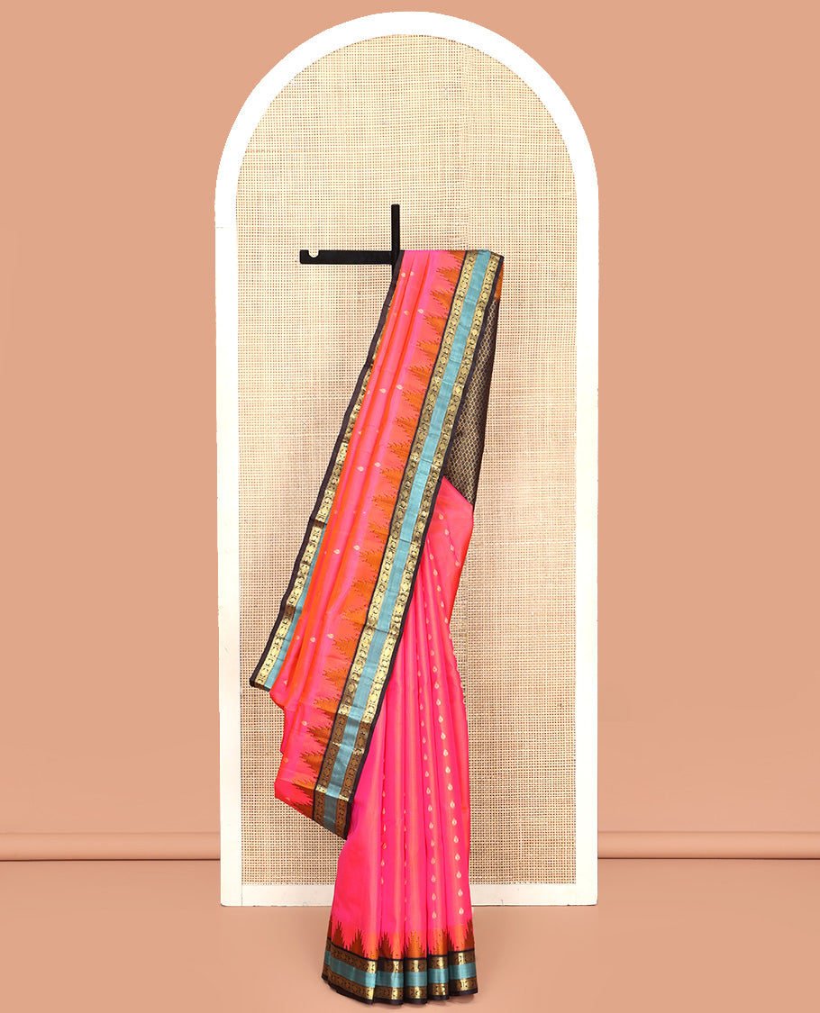 Pink Vasundhara Silk Saree, Adorned with Zari Buttas All Over Its Body, Complemented by Contrast Temple Rettai Pettu Border of Manga and Poun Designs, Grand Pallu and Paired with a Contrast Blouse