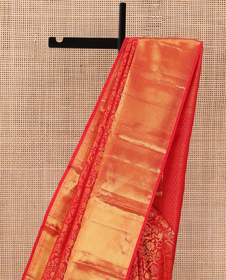 Red floral jacquard wedding silk saree, traditional zari design border, and zari-rich jaal pallu