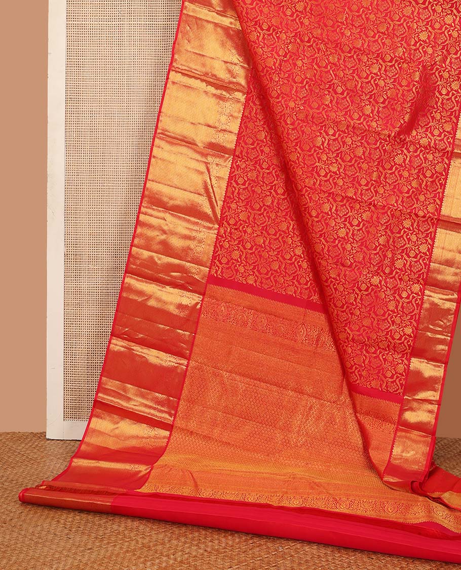Red floral jacquard wedding silk saree, traditional zari design border, and zari-rich jaal pallu