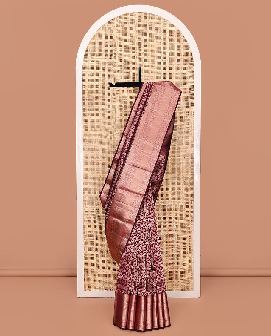 Maroon Kanchipuram Wedding Silk Saree, Elegantly Embellished with Jacquard Design on Its Body, Highlighted by Zari Border of Thilakam Mokku, Kathir, Cross Kamalam, and Mayil Kann Designs, Grand Jaal Pallu, and Paired with a Matching Blouse