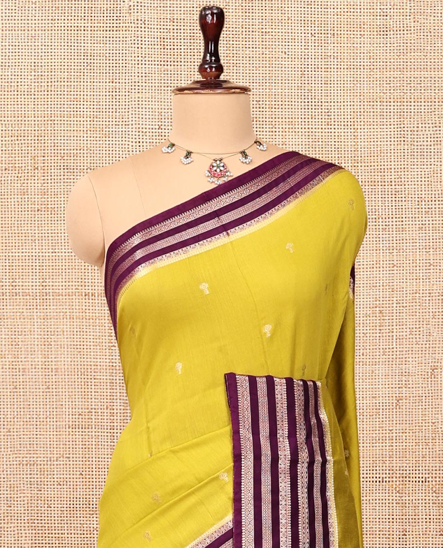 Green Assam Silk Saree, Ornamented with Zari Buttas, Complemented by a Contrast Traditional Zari Border, Striped Pallu, and a Contrast Blouse