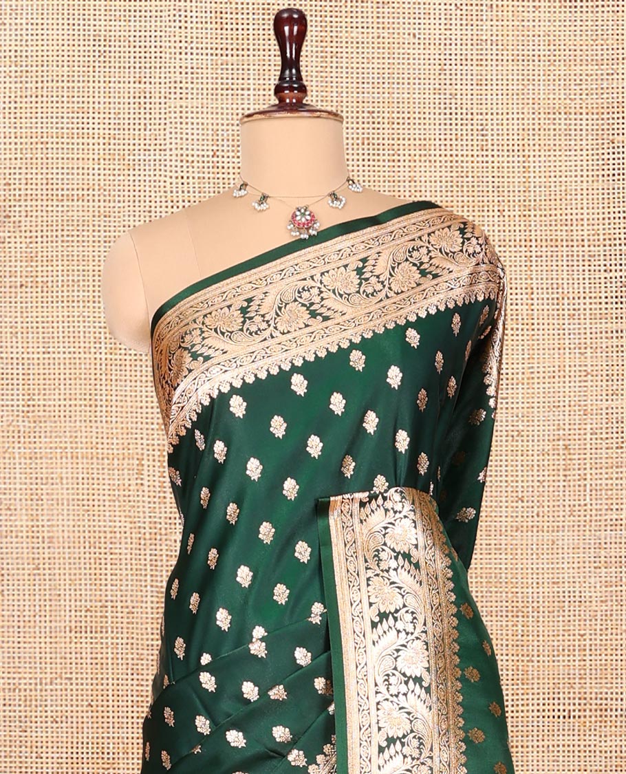 Green Banarasi Nylon Saree Showcasing Buttas, Floral Creeper Zari Border, Intricate Pallu, and a Contrast Blouse