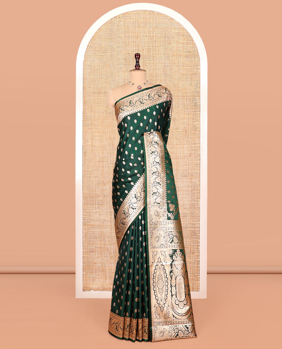 Green Banarasi Nylon Saree Showcasing Buttas, Floral Creeper Zari Border, Intricate Pallu, and a Contrast Blouse