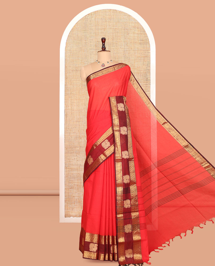 Red Plain Chettinad Cotton Saree, Complemented by a Contrast Traditional Zari Elephant-Peacock Border, Striped Pallu, and a Matching Blouse
