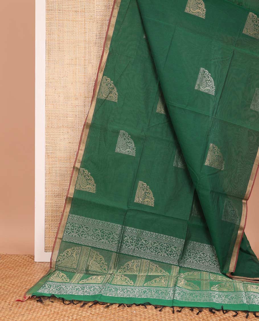 Green zari buttas Coimbatore cotton saree, zari piping border, and pallu of Mughal style peacock designs