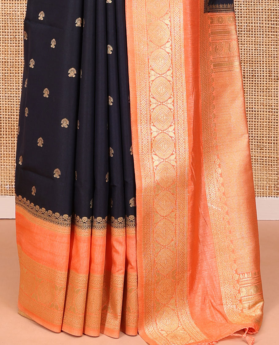 Navy Blue Dupion Silk Saree, Adorned with Buttas All Over Its Body, Complemented by Contrast Traditional Border of Paisleys and Chakram Designs, Intricately Designed Pallu, and Paired with a Contrast Blouse