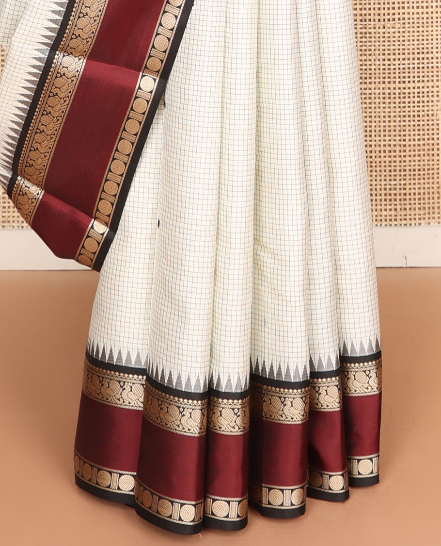 White micro-checks & buttas kanchipuram silksaree,contrast rettai pettu border of salngai,banaras,mayil & rudraksham & seppu rekku pallu