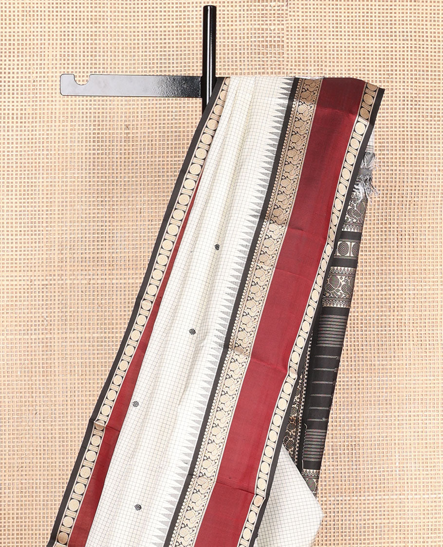 White micro-checks & buttas kanchipuram silksaree,contrast rettai pettu border of salngai,banaras,mayil & rudraksham & seppu rekku pallu