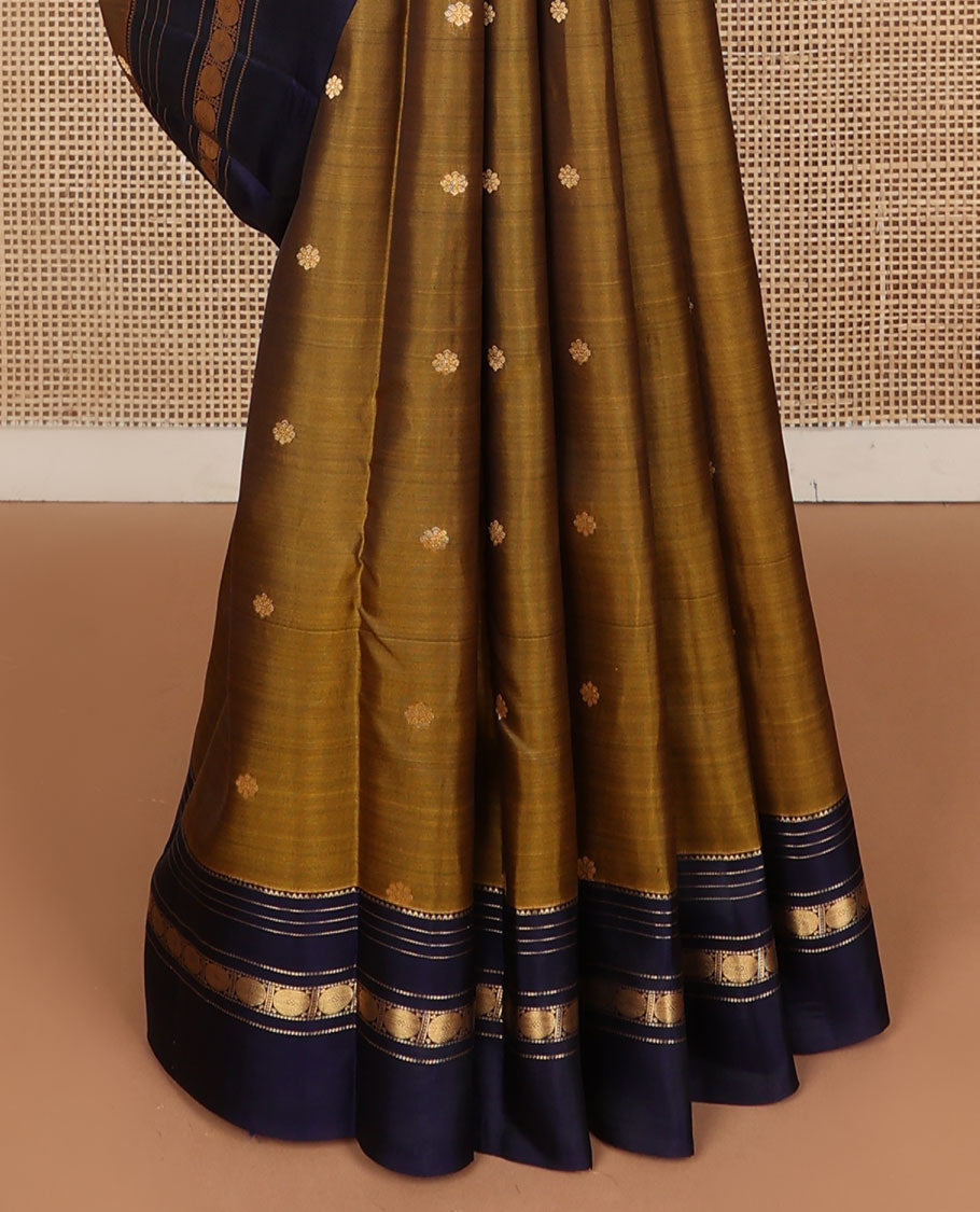 Mehendi green zari buttas Kanchipuram silk saree, contrast jaal pallu & rettai pettu border of rekku, muthu & rudraksham designs