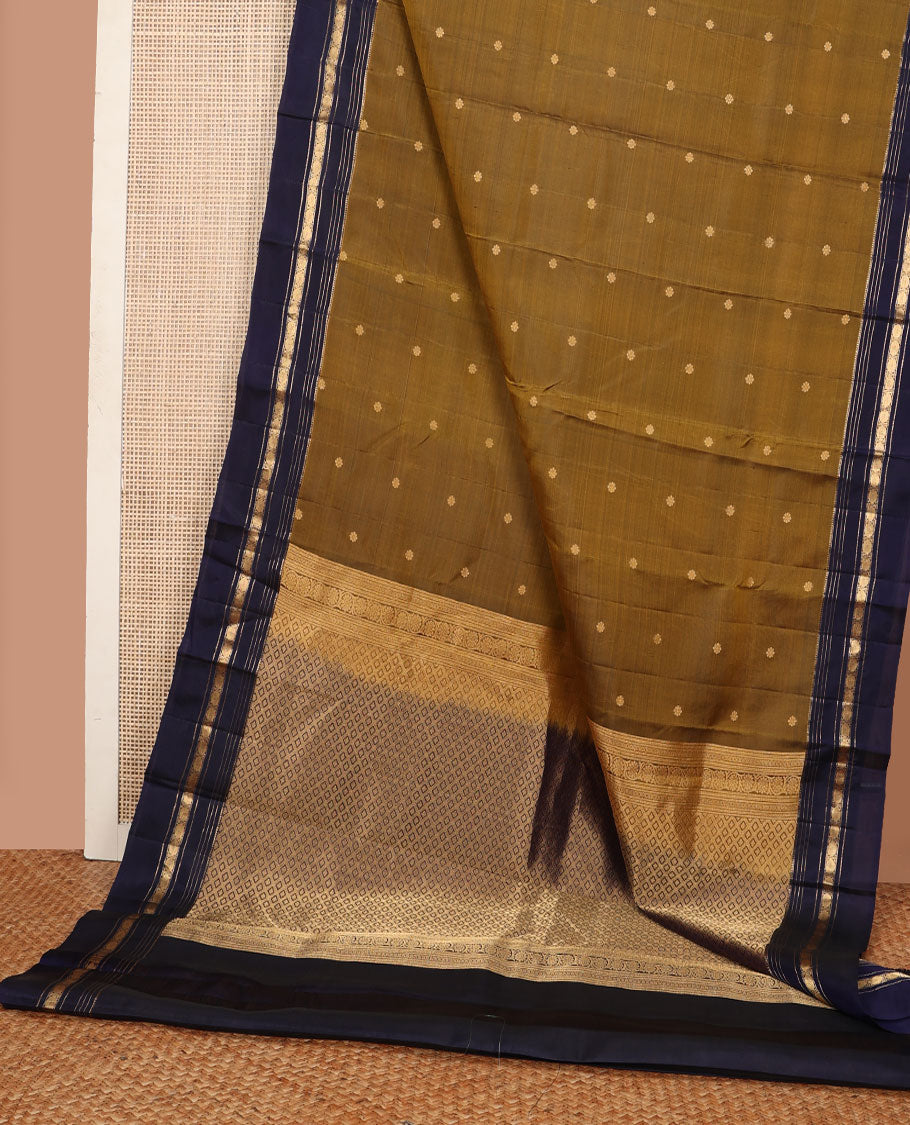 Mehendi green zari buttas Kanchipuram silk saree, contrast jaal pallu & rettai pettu border of rekku, muthu & rudraksham designs