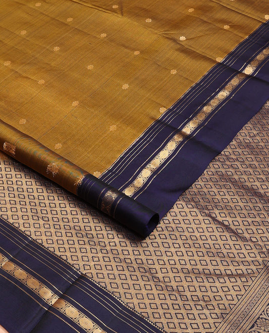 Mehendi green zari buttas Kanchipuram silk saree, contrast jaal pallu & rettai pettu border of rekku, muthu & rudraksham designs