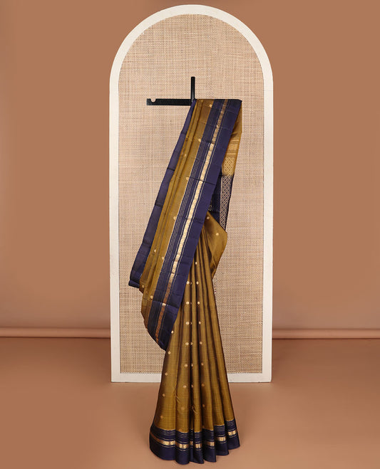 Mehendi green zari buttas Kanchipuram silk saree, contrast jaal pallu & rettai pettu border of rekku, muthu & rudraksham designs