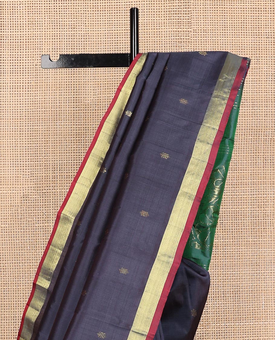 Dark blue zari buttas Kanchipuram silk saree, contrast bavanji border, and floral zari design pallu