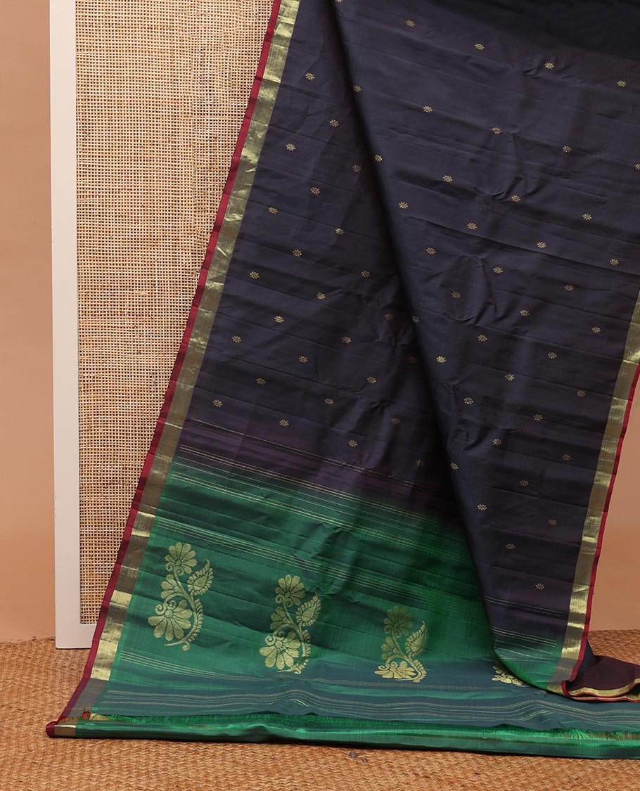 Dark blue zari buttas Kanchipuram silk saree, contrast bavanji border, and floral zari design pallu