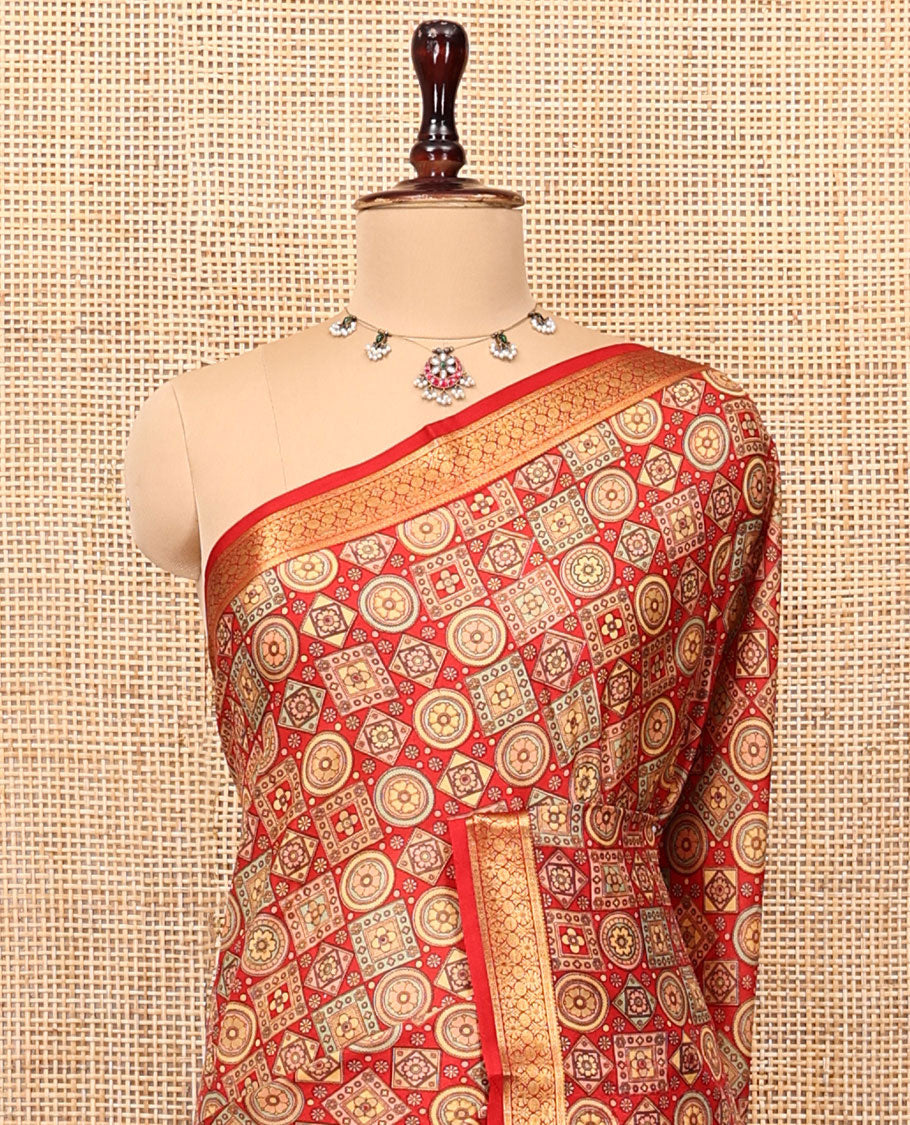 Red Printed Silk Saree, Gracefully Embellished with Geometric Prints, Highlighted by a Traditional Zari Border, Printed Pallu, and a Matching Blouse