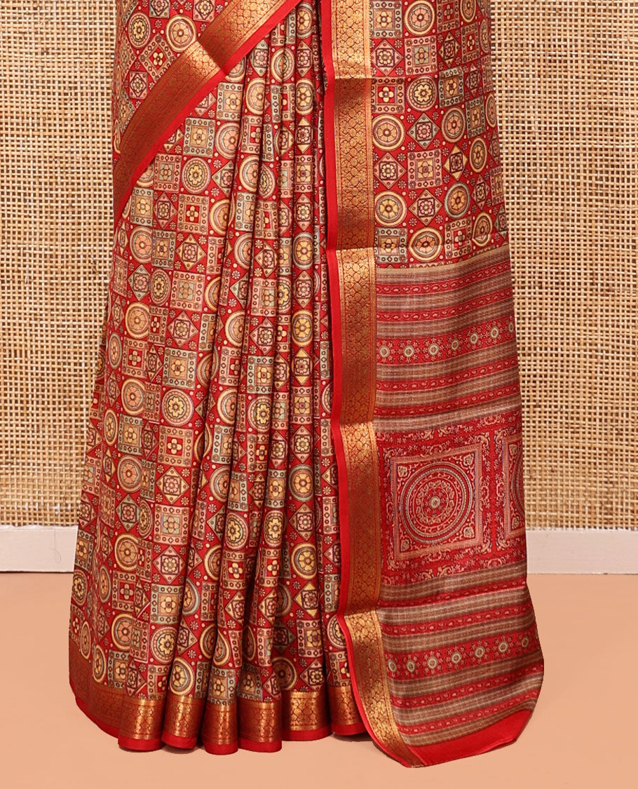 Red Printed Silk Saree, Gracefully Embellished with Geometric Prints, Highlighted by a Traditional Zari Border, Printed Pallu, and a Matching Blouse