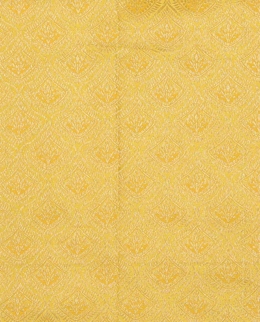 Yellow pure silk half-saree, jacquard skirt, contrast border of thilakam mokku,banaras, mayil kann,cross kamalam, and then kuli kann , contrast zari blouse, and zari design dhavani
