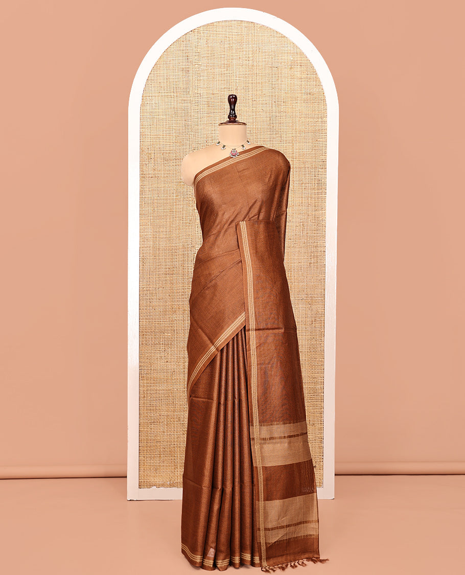 Brown Plain Tussar Silk Saree, a Piping Border, Self-Pallu of Stripes, and Matching Blouse