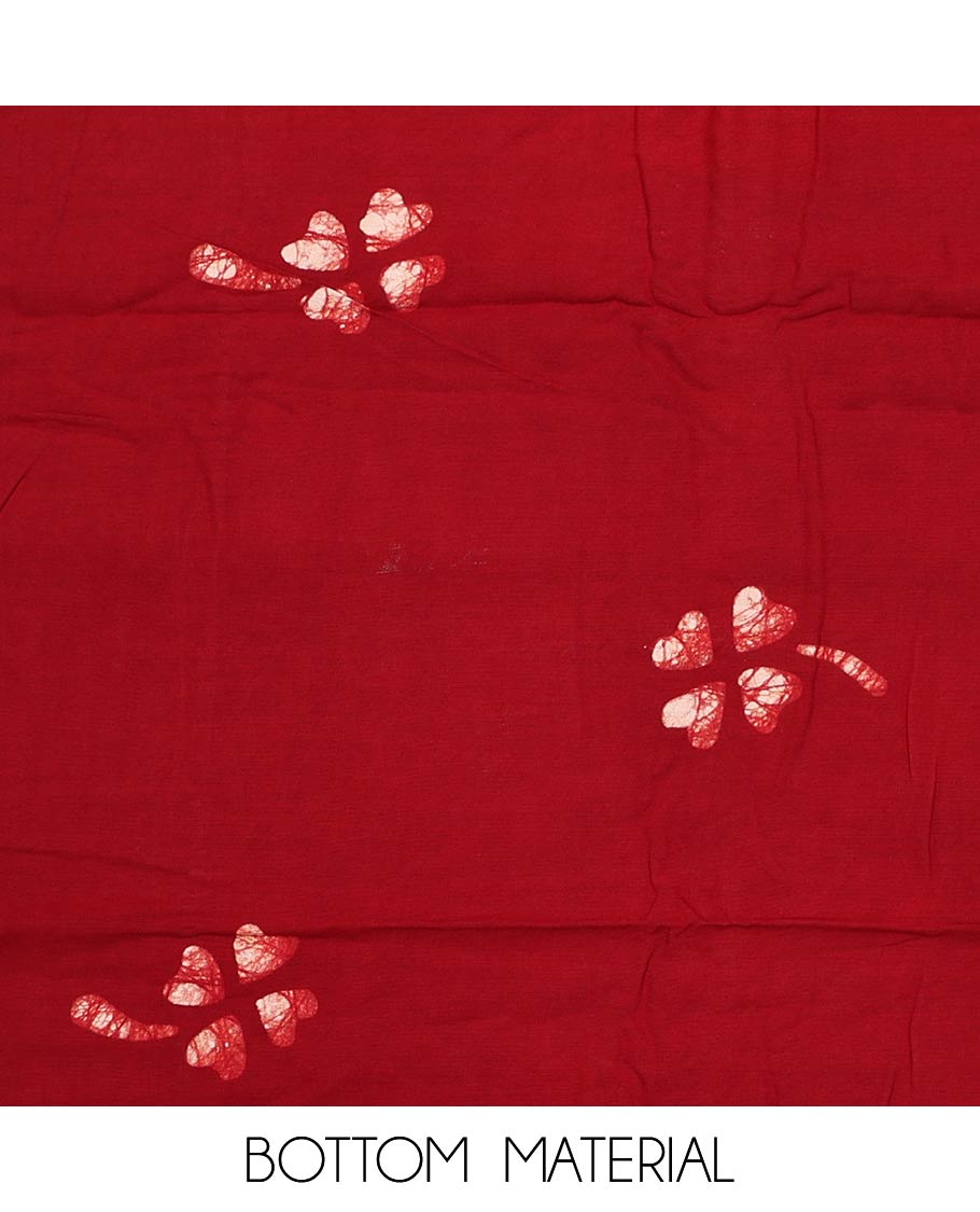 Black material churidar set, colorful batik print, thread outline embroidery, and mirror work cotton top, contrast batik printed cotton bottom, and batik printed chiffon dupatta