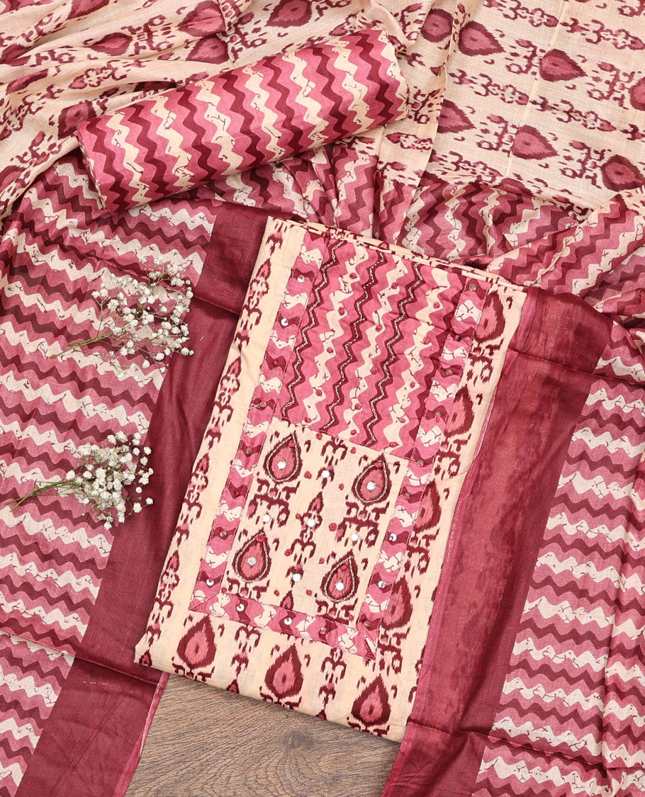 Sandal-Base and Red Cotton Material Chudidar Set, Adorned with Batik-Style Intricate Print on Its Top, a Batik Chevron Printed Cotton Bottom, and Paired with an Intricately Printed Dupatta
