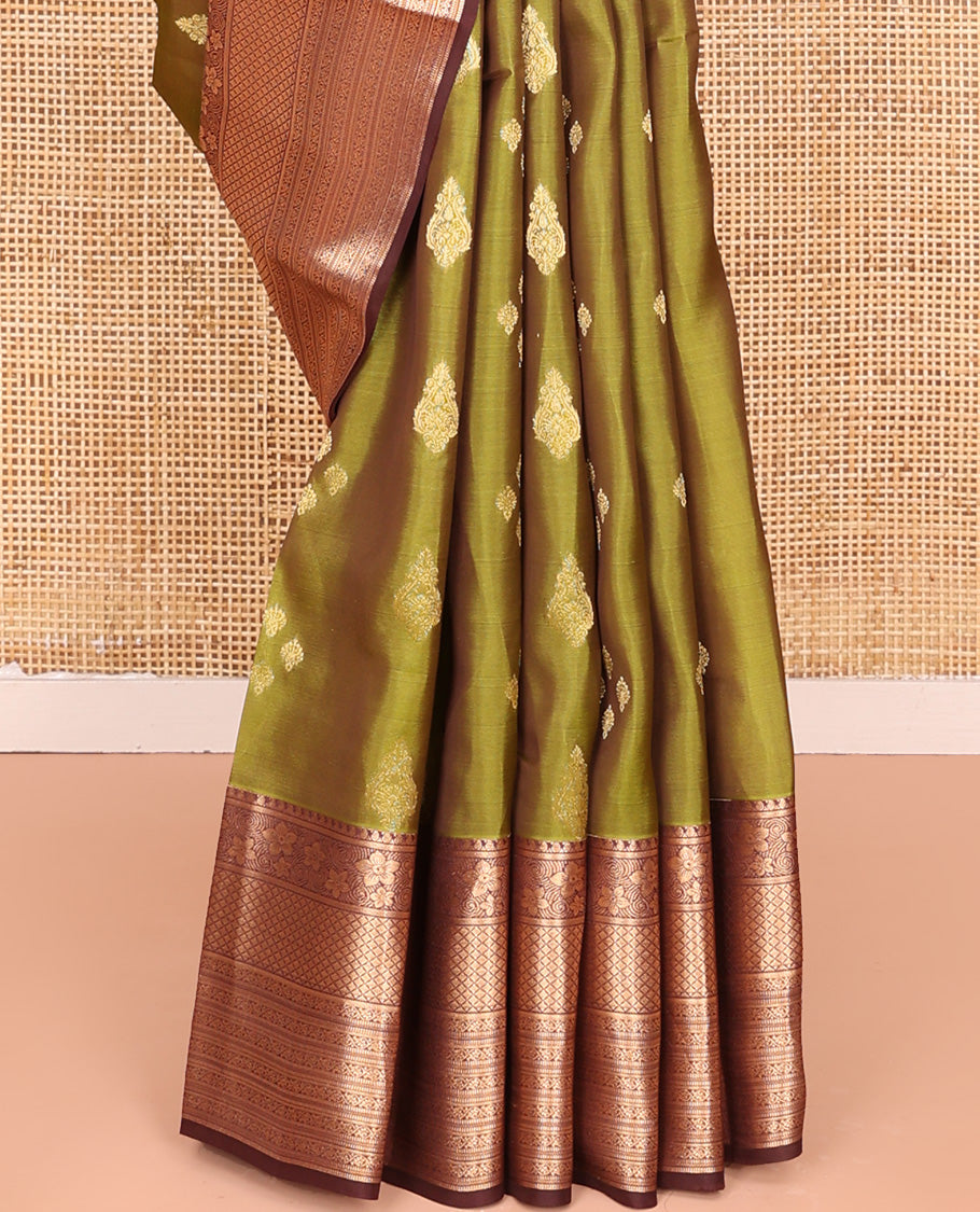 Green Vasundhara Lite Silk Mix Saree, Elegantly Framed with Zari Buttas All Over Its Body, Complemented by Contrast Border of Manga, Floral, Jaal, and Kodi Visiry Designs, Grand Jaal Pallu and Paired with a Contrast Blouse