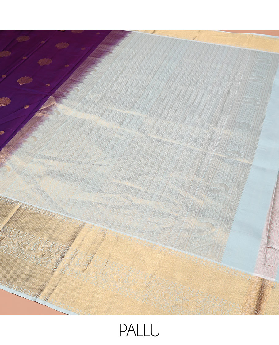 Violet Vasundhara Silk Saree, Richly Detailed with Zari Buttas, Complemented by a Contrast Border of Rekku, Rudraksham, Mayil Kann, and Mayil Designs, Pallu Beautified with Chevron Designs, and Paired with a Contrast Blouse
