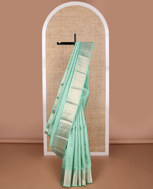 Sea green floral design kancheepuram silk saree with self border of banaras, muthu, paun design & floral pallu