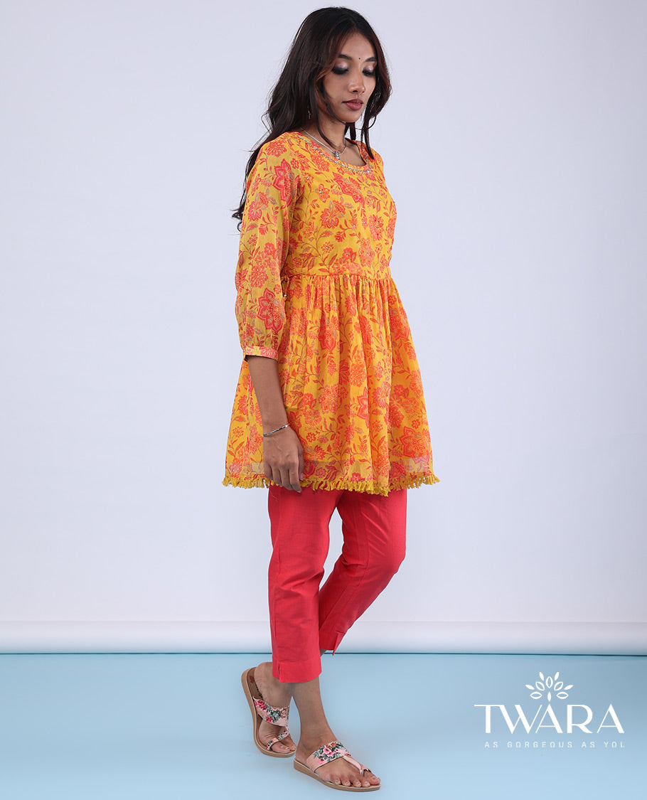 Twara marigold orange floral vine printed with bead embroidery 3/4th sleeve tie-up tassel top