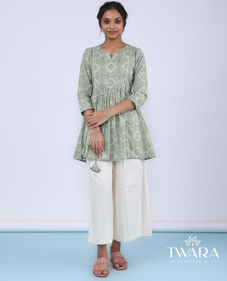 Twara green bandhani-style intricately printed with mirror embroidery 3/4th sleeve tie-up top
