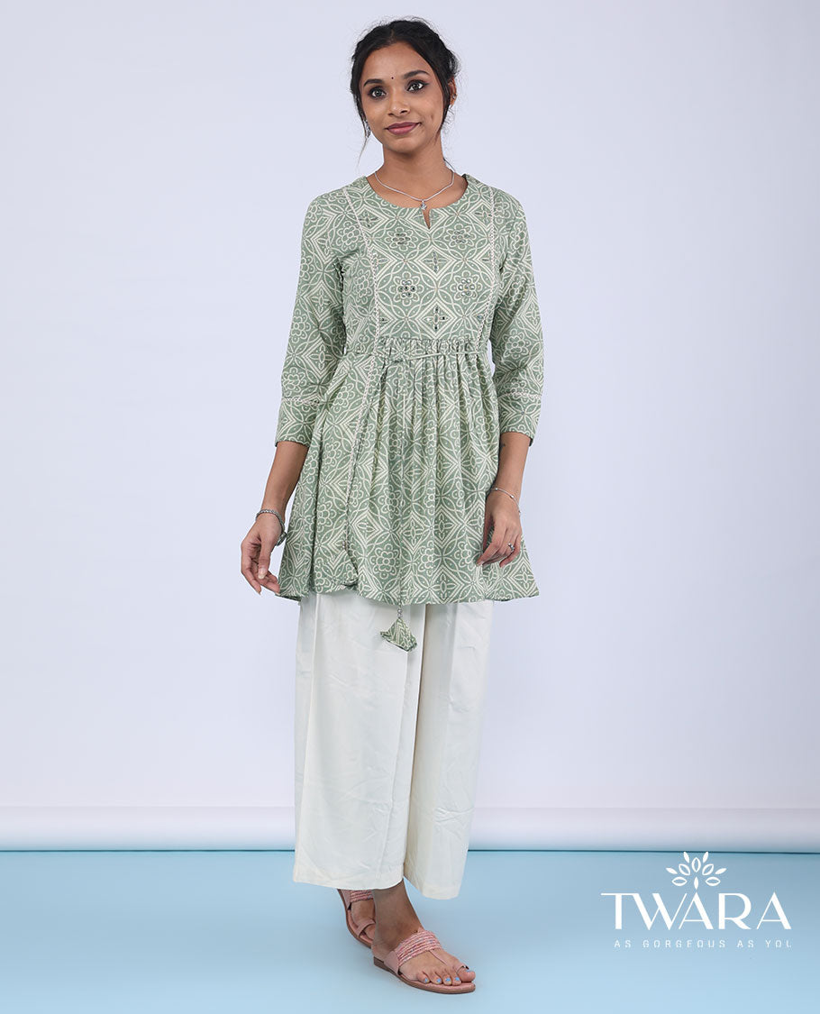 Twara green bandhani-style intricately printed with mirror embroidery 3/4th sleeve tie-up top