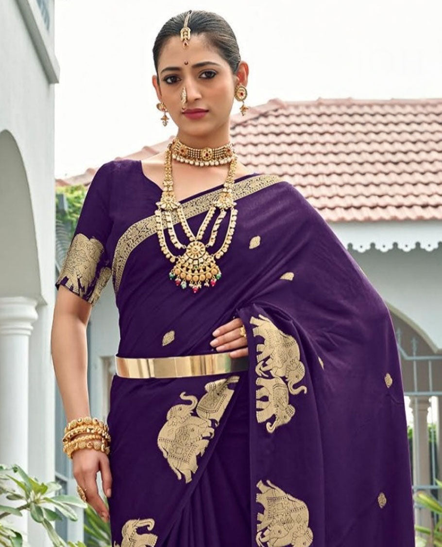 Violet Designer Saree Highlighted with Zari Buttas, Featuring a Self-Border Depicting a Herd of Elephants, Subtly Woven Pallu of Spare Stripes, and Paired with a Matching Blouse of Elephant Motifs