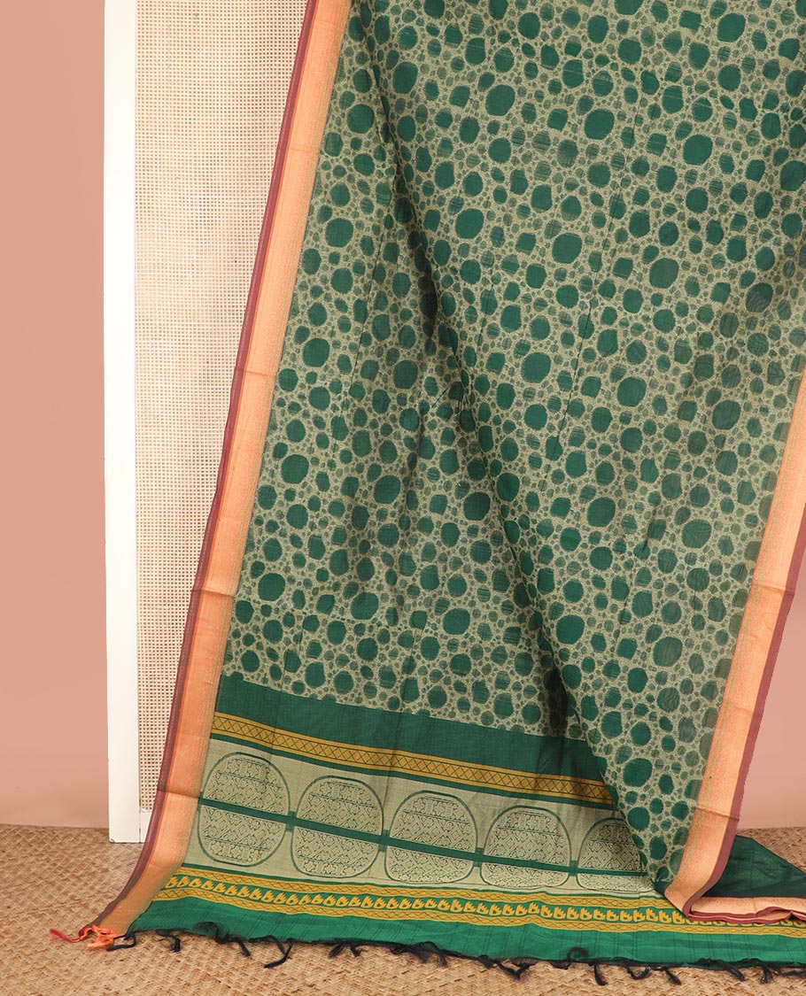 Green Coimbatore Cotton Saree Beautified with 3d Textures All Over Its Body, Complemented by Contrast Border, Pallu Depicts Intricate Designs, and Is Paired with a Matching Blouse