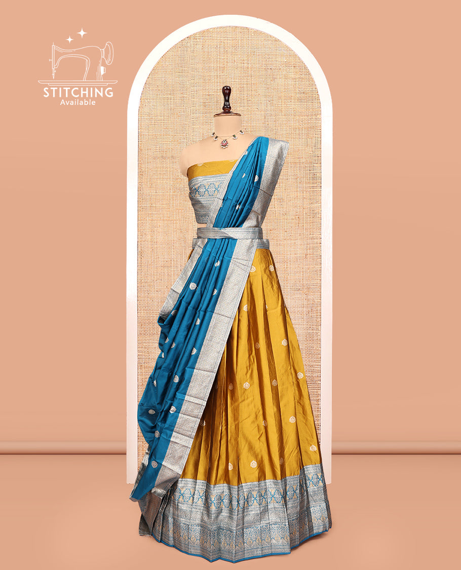 Mustard-Blue Banarasi Half-Saree, Elevated with Zari Buttas, a Contrast Traditional Zari Border, a Matching Blouse, and a Contrast Dhavani