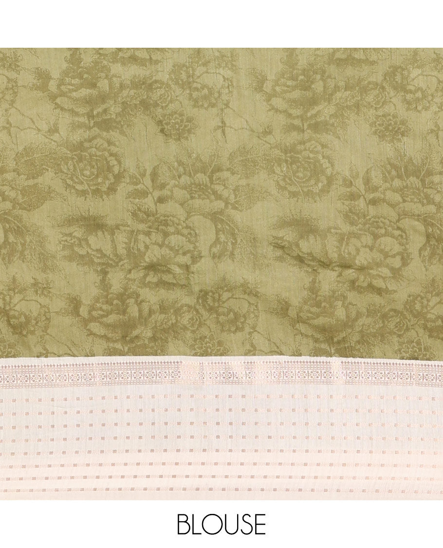 Olive green silhouette-style floral discharge printed Assam silk saree, contrast traditional zari border of rudraksham motifs, zari striped pallu, and a floral printed blouse