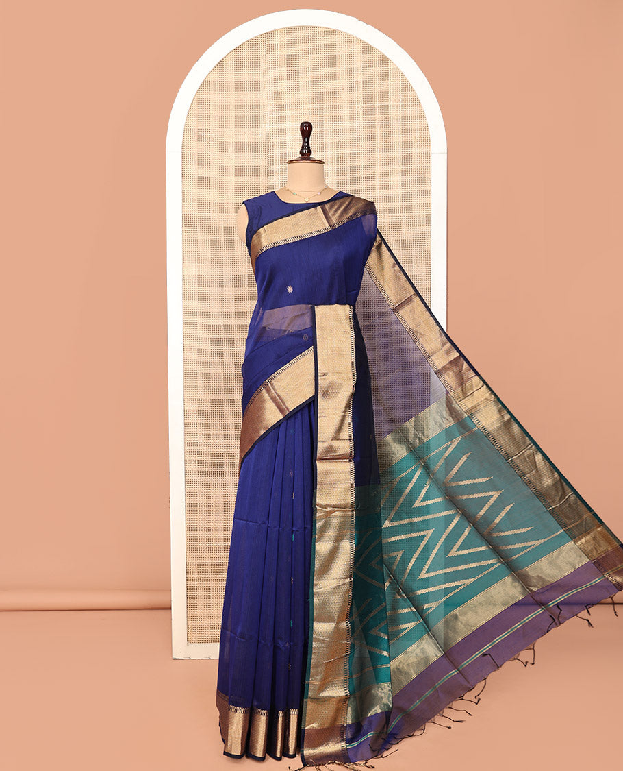 Blue Maheshwari Cotton Saree, Gleamed Up with Zari Buttas on Its Body, Highlighted by a Traditional Zari Design Border, Complemented by a Contrast Pallu of Chevron Designs, and Paired with a Contrast Blouse