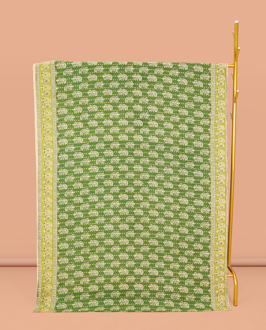 Light Green Machine-Printed Kalamkari Cotton Saree, Steeped with Paisley Motifs on Its Body, Complemented by a Contrast Paisley Printed Border, Pallu Steeped with Paisley Print, and Paired with a Printed Blouse