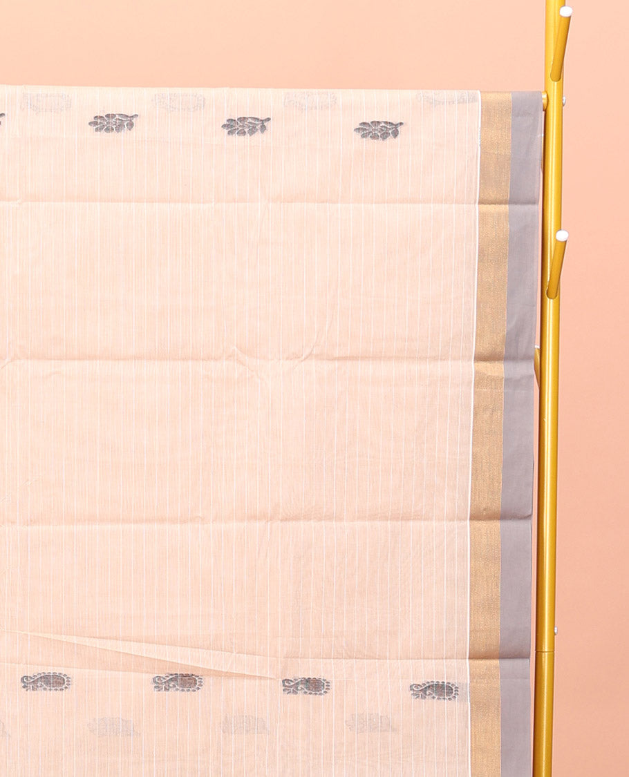 Cream Kanchi Cotton Saree, Bedecked with Buttas and Stripes All Over Its Body, Complemented by Contrast Border, Ogee Patterned Pallu, and Paired with a Matching Blouse
