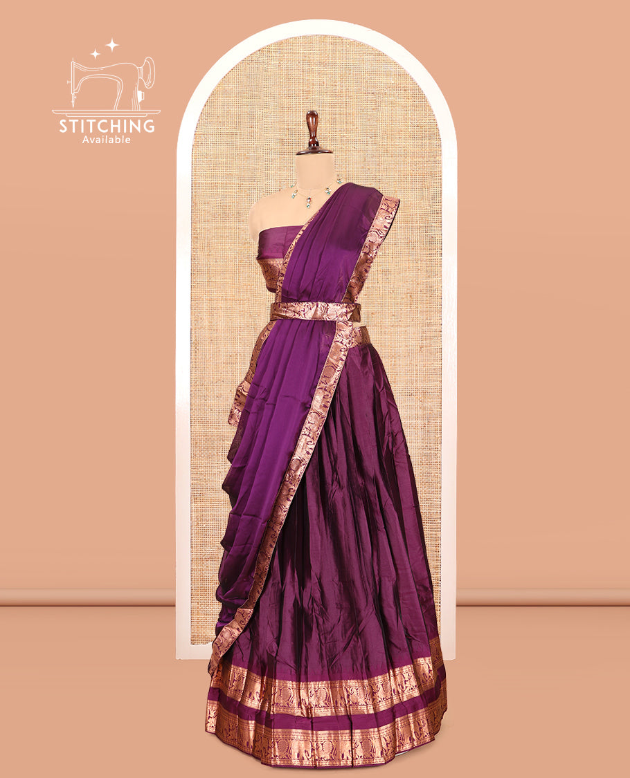 Magenta Semi-Silk Half-Saree Features Plain Skirt, a Rettai Pettu Elephant-Peacock Border, Matching Blouse, and a Dhavani