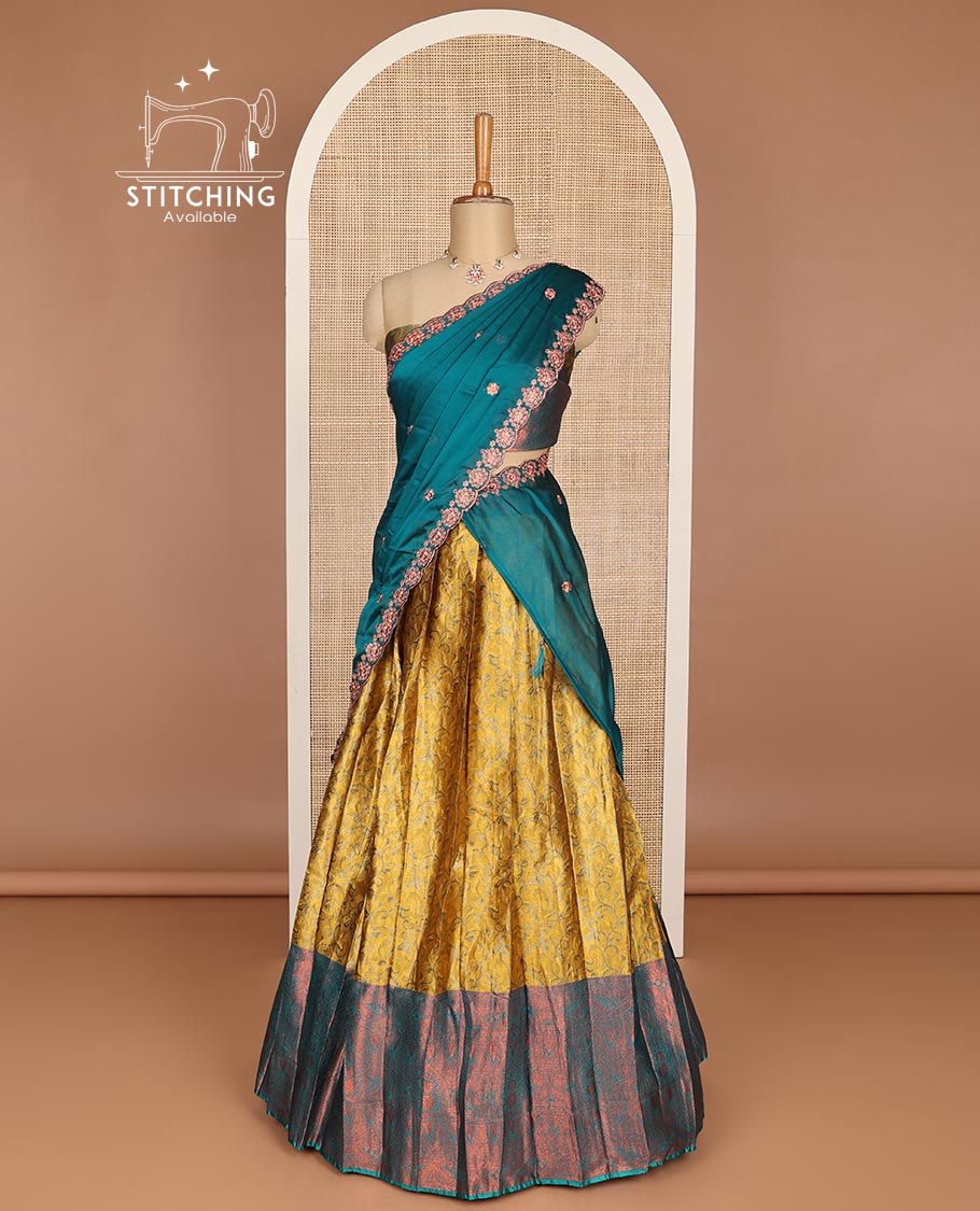Mustard floral jaal art silk half saree with contrast intricate zari design border, zari design blouse & floral embroidery scallop border dhavani