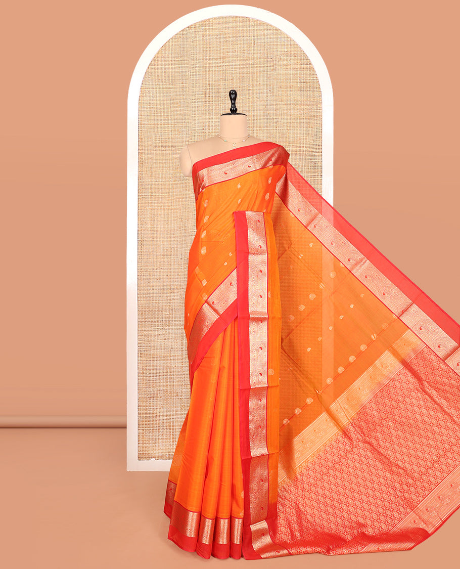 Orange Silk Cotton Saree, Accentuated with Buttas, a Contrast Traditional Zari Paisley Design Border, Pallu of Intricate Designs, and Contrast Blouse