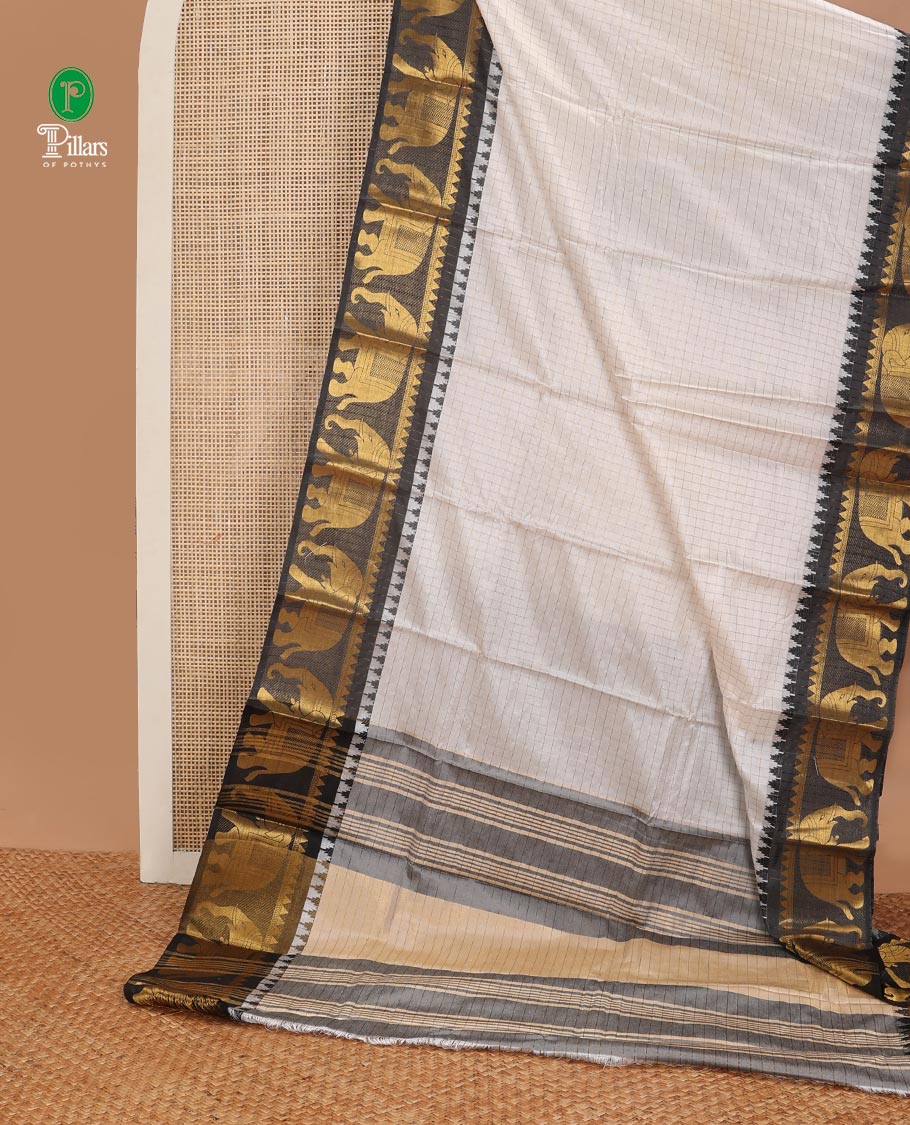 White zari checked design dola silk saree with contrast elephant design border & chit pallu along with checked design blouse