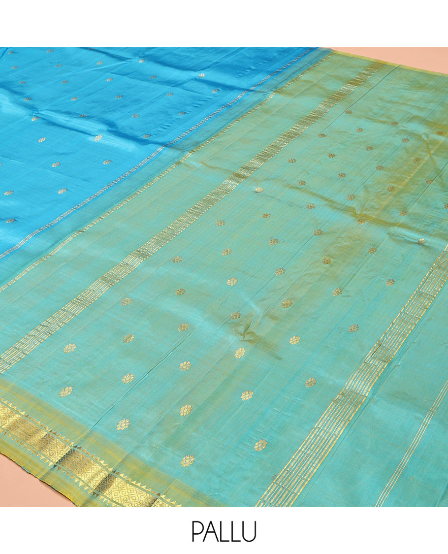 Blue Kanchipuram Silk Saree, Woven with Zari Buttas, Complemented by Contrast One-Sided Border of Rekku, and Mayil Kann Designs, Zari Design Pallu, and No Blouse
