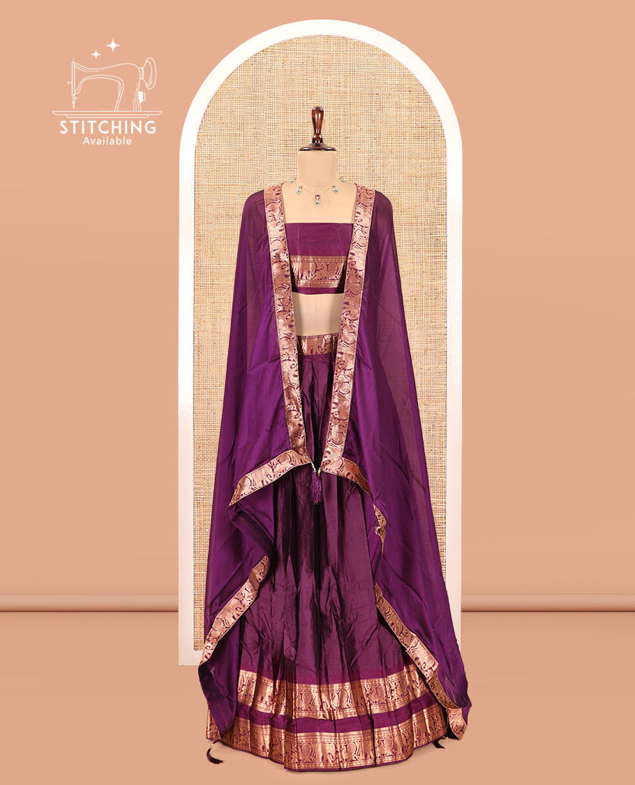 Magenta Semi-Silk Half-Saree Features Plain Skirt, a Rettai Pettu Elephant-Peacock Border, Matching Blouse, and a Dhavani