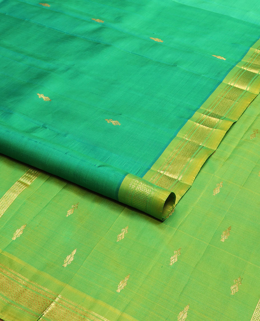 Green zari buttas Kanchipuram silk saree, contrast one-sided border of banaras, neli & jaal & zari design pallu