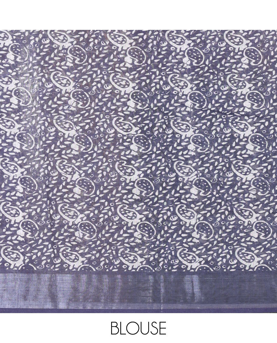 Blue batik style paisleys printed linen cotton saree, contrast batik printed with zari border, batik paisleys printed pallu, and a contrast printed blouse
