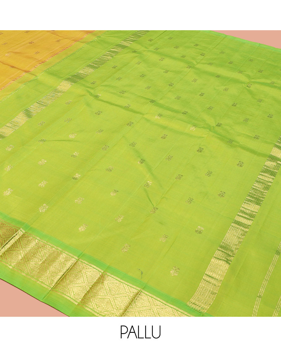 Green Kanchipuram Silk Saree, Graced with Zari Buttas, a Contrast One-Sided Jaal Design Zari Border, Zari-Woven Pallu, and No Blouse